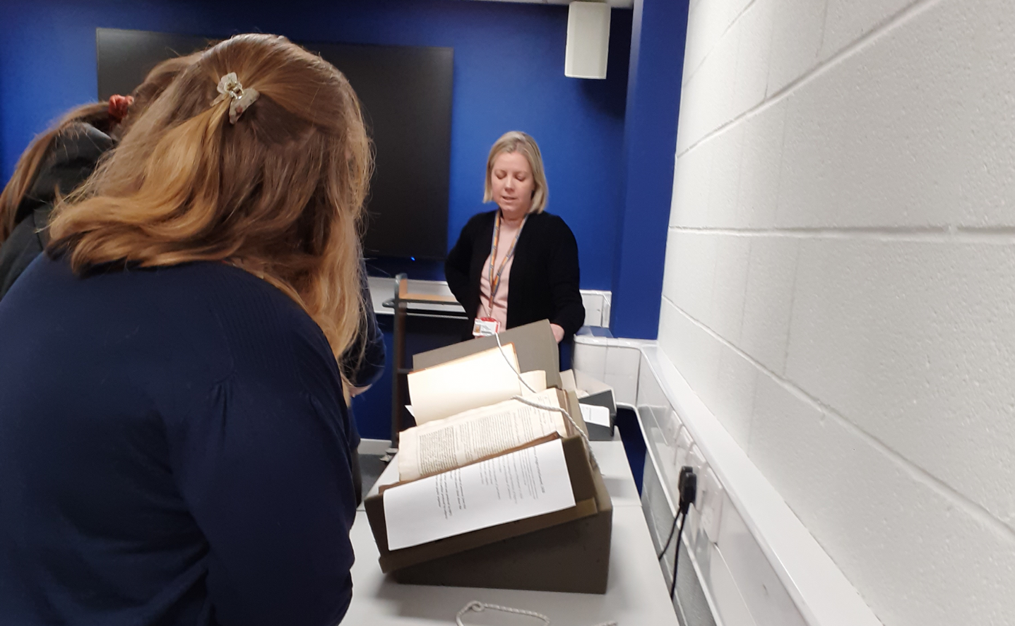A student looking at archival materials